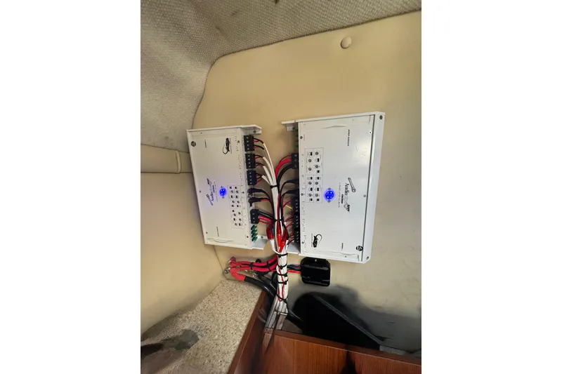Slide: The Image of Electrical panel with wiring in a 2008 Regal 2520 FasDeck boat. - 42