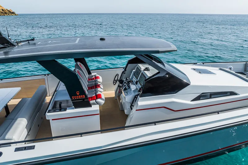 Slide: The Image of 2023 Chaser 54 Laguna yacht on open sea, featuring sleek design and modern amenities. - 13