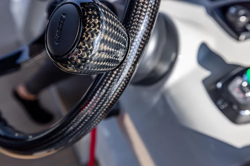 Slide: The Image of Close-up of 2025 Chaser 54 Laguna steering wheel with carbon fiber detailing. - 19