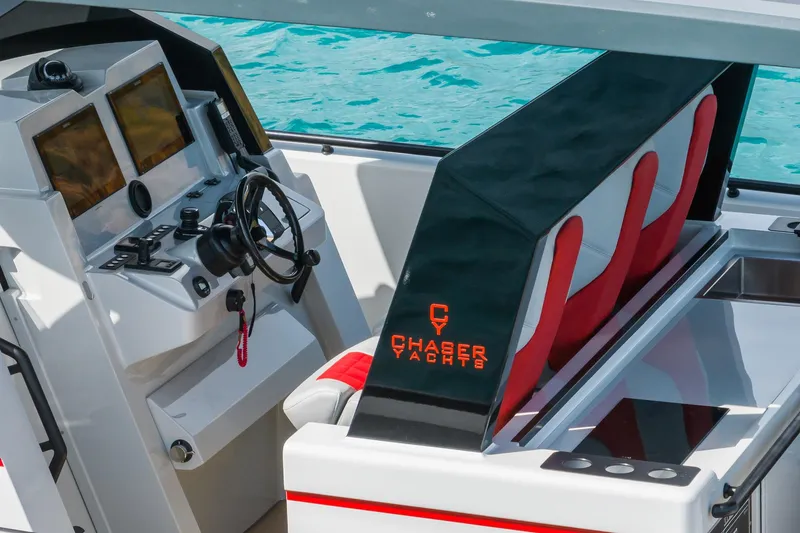 Slide: The Image of Cockpit of 2023 Chaser 54 Laguna yacht with modern controls and seating. - 21
