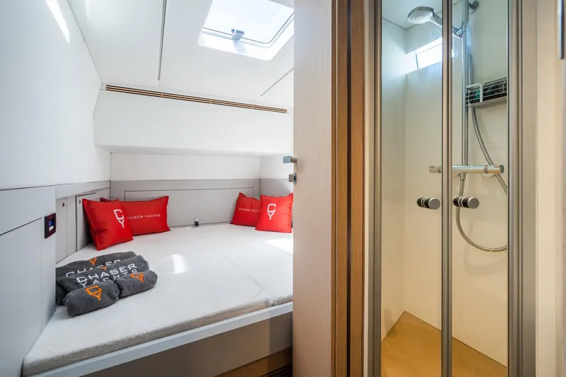 Slide: The Image of Luxurious cabin interior of 2023 Chaser 54 Laguna yacht with bed and shower. - 3