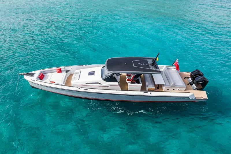 Slide: The Image of 2023 Chaser 54 Laguna boat on clear turquoise water. - 36