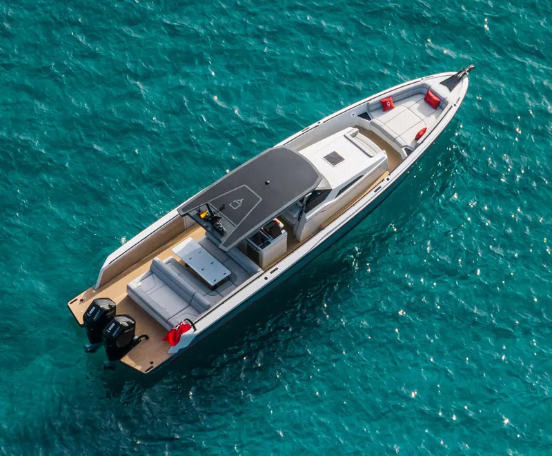 Slide: The Image of Aerial view of 2023 Chaser 54 Laguna yacht on turquoise water. - 37