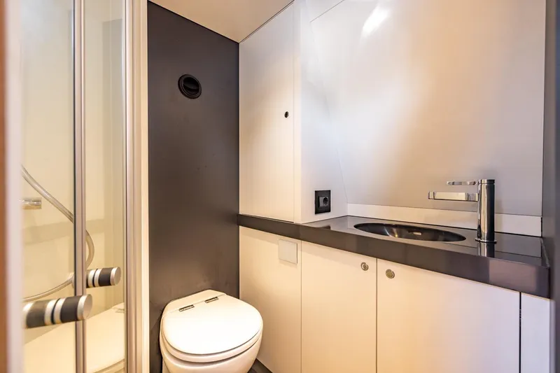 Slide: The Image of Modern bathroom in 2025 Chaser 54 Laguna yacht with sleek fixtures and compact design. - 4