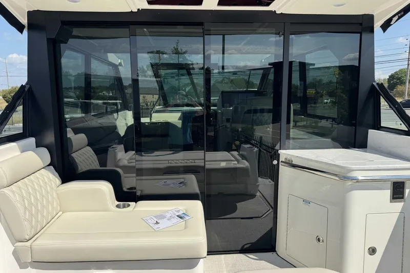 Slide: The Image of 2026 Regal 36 Grande Coupe interior with luxurious seating and modern design. - 12