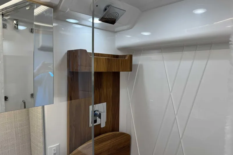 Slide: The Image of Luxurious bathroom interior of 2026 Regal 36 Grande Coupe yacht. - 25