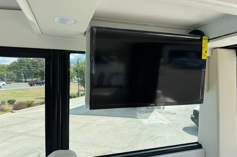 Slide: The Image of 2026 Regal 36 Grande Coupe interior with mounted Samsung TV. - 43