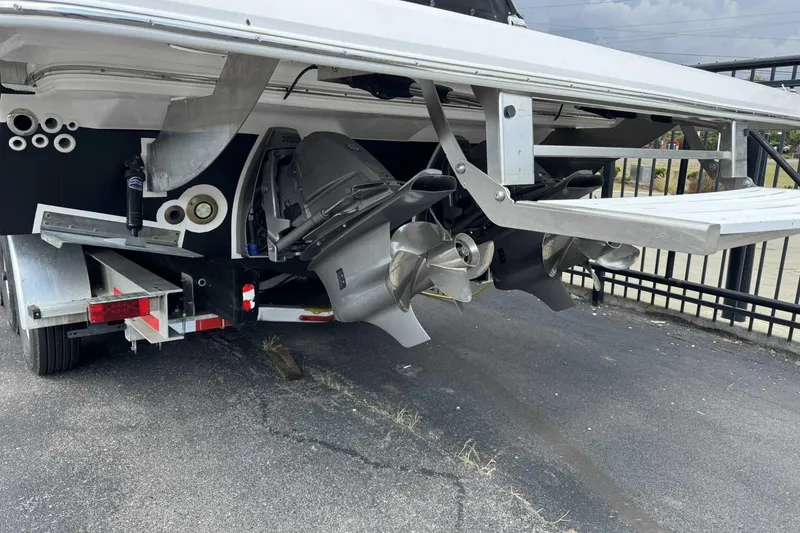 Slide: The Image of 2026 Regal 36 Grande Coupe boat propellers and trailer detail. - 5