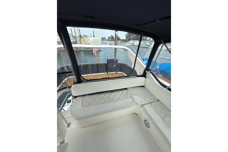 Slide: The Image of 1997 Bayliner 3788 Command Bridge Motoryacht interior with marina view. - 11