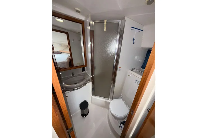 Slide: The Image of Bathroom interior of 1997 Bayliner 3788 Command Bridge Motoryacht with shower and sink. - 35
