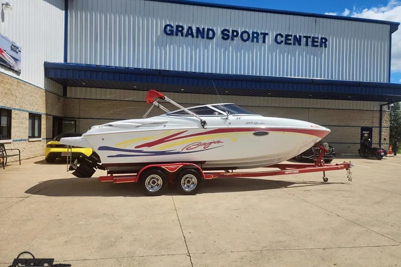 The Image of 2005 Baja 242 Islander boat on trailer at Grand Sport Center. - 1