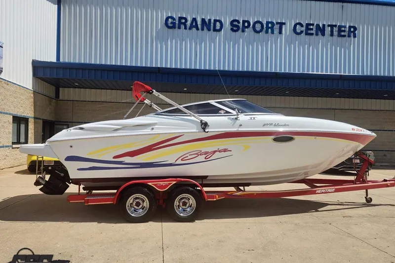Slide: The Image of 2005 Baja 242 Islander boat on trailer at Grand Sport Center. - 3