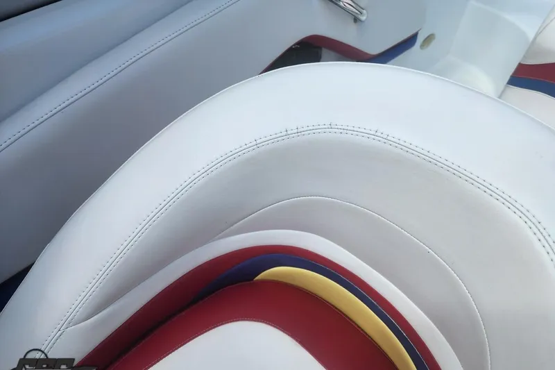 Slide: The Image of White and multicolored boat seat in 2005 Baja 242 Islander. - 52