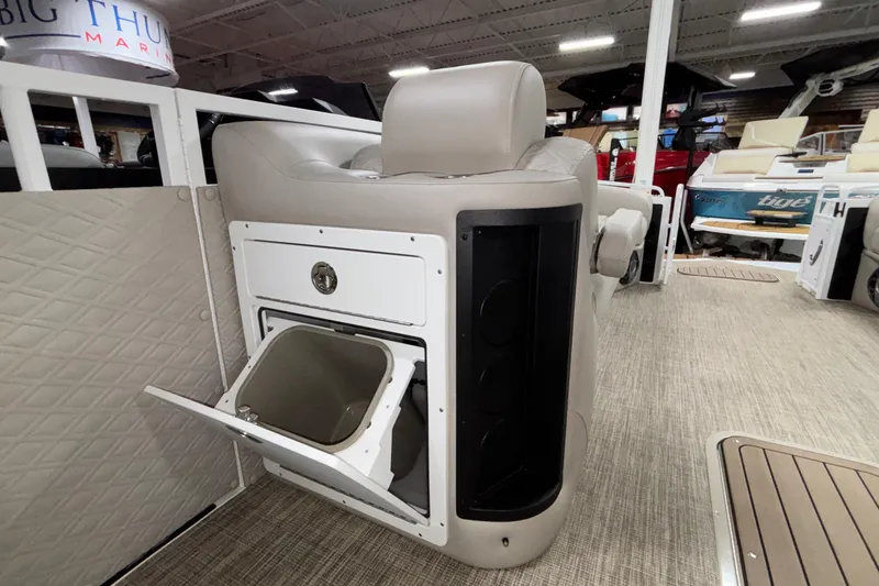Slide: The Image of Interior of 2026 JC Sporttoon 26TT boat with storage compartment and seating. - 24