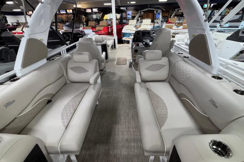 Slide: The Image of 2026 JC Sporttoon 26TT pontoon boat interior with luxurious seating and modern design. - 9