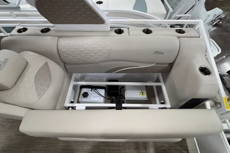 Slide: The Image of Luxurious seating on 2026 JC Sporttoon 26TT boat with integrated storage and cup holders. - 20