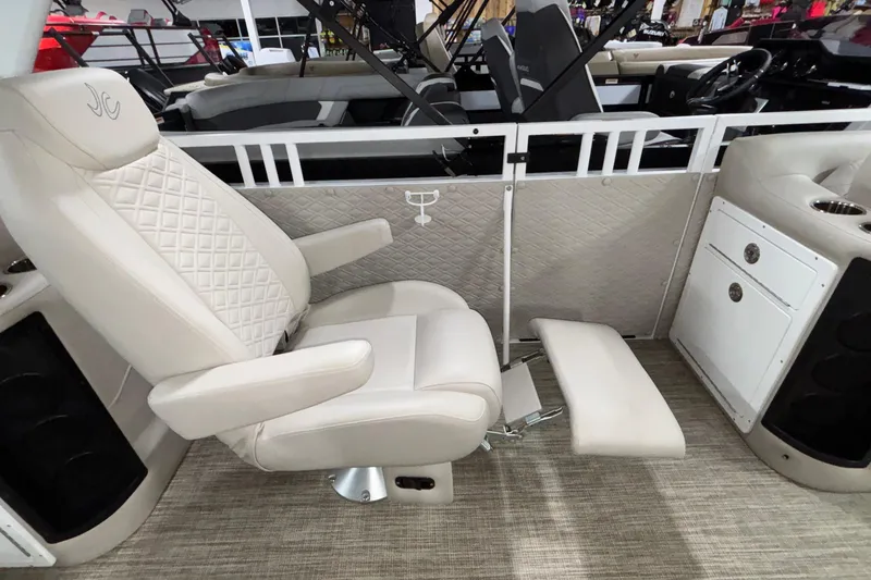 Slide: The Image of Luxurious seating in 2026 JC Sporttoon 26TT boat with reclining chair and footrest. - 23