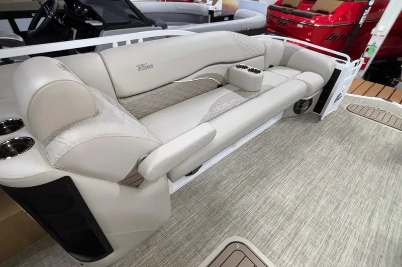 Slide: The Image of Luxurious seating on 2026 JC Sporttoon 26TT pontoon boat with cup holders and elegant design. - 27
