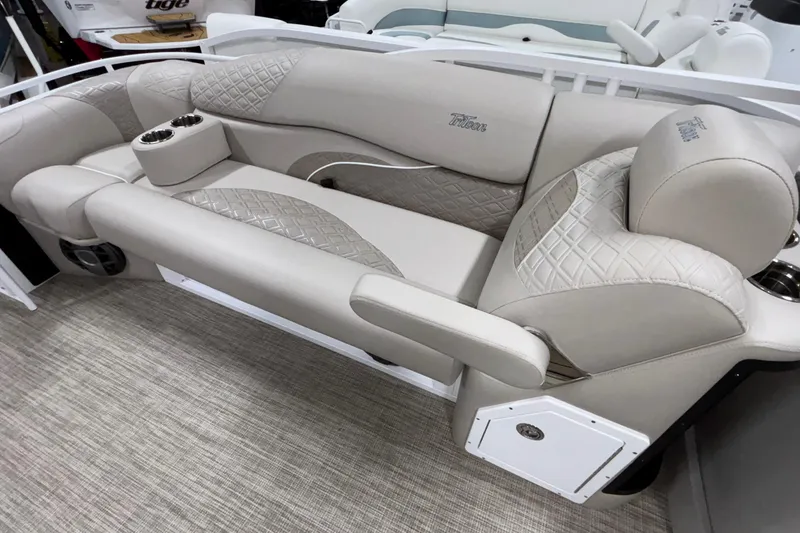 Slide: The Image of Luxurious seating on 2026 JC Sporttoon 26TT boat with quilted upholstery and cup holders. - 28