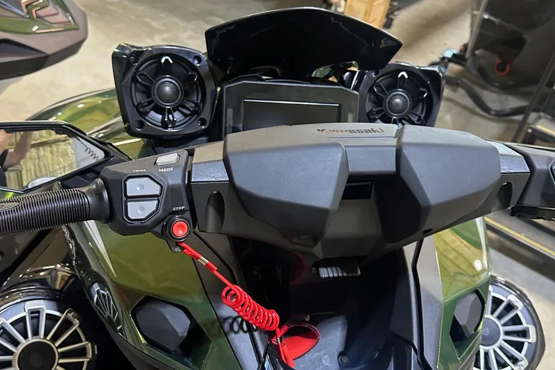 Slide: The Image of 2025 Kawasaki Jetski Ultra 310LX dashboard with speakers and control panel. - 5