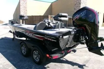 Slide: The Image of 2024 Tracker Pro Team 195 Tournament Edition boat with dual axle trailer. - 3