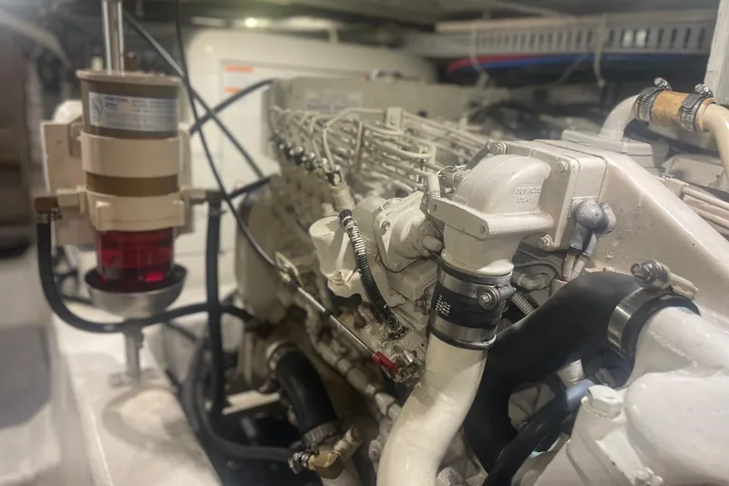 Slide: The Image of Engine room of 2000 Carver 456 Aft Cabin Motor Yacht, showcasing detailed machinery components. - 15