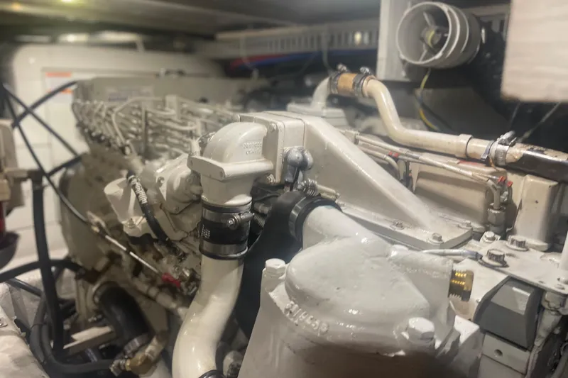 Slide: The Image of Engine room of 2000 Carver 456 Aft Cabin Motor Yacht, showcasing detailed machinery. - 16