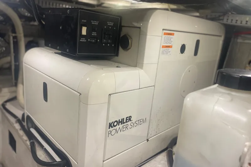 Slide: The Image of Kohler power system in 2000 Carver 456 Aft Cabin Motor Yacht engine room. - 19