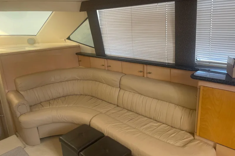 Slide: The Image of Interior of 2000 Carver 456 Aft Cabin Motor Yacht with beige leather seating. - 7