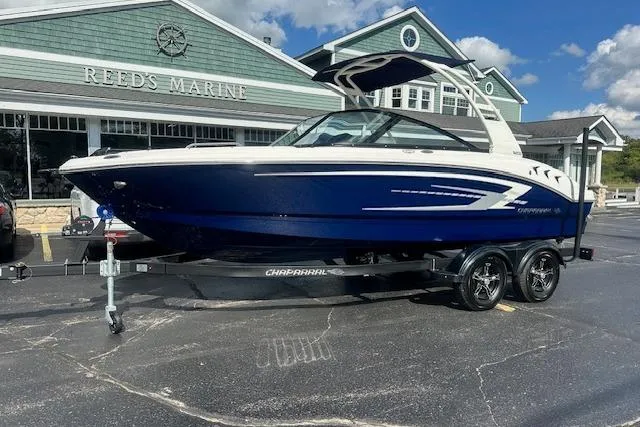 The Image of 2026 Chaparral 21 SSi boat on trailer outside Reed's Marine dealership. - 0