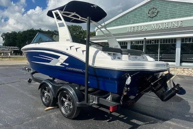 Slide: The Image of 2026 Chaparral 21 SSi boat on trailer at Reed's Marine dealership. - 1