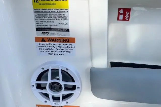 Slide: The Image of Chaparral 21 SSi 2026 boat warning labels and speaker detail. - 11