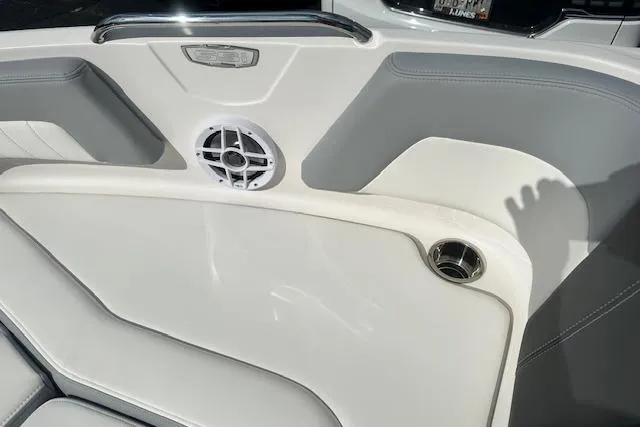 Slide: The Image of Interior of 2026 Chaparral 21 SSi boat with speaker and cup holder. - 18