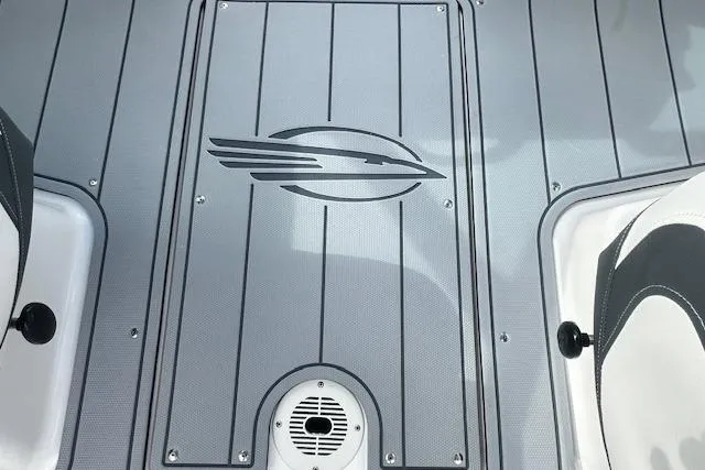 Slide: The Image of 2026 Chaparral 21 SSi boat deck with logo and sleek design. - 29