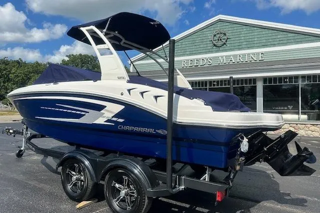 Slide: The Image of 2026 Chaparral 21 SSi boat on trailer at Reed's Marine dealership. - 36