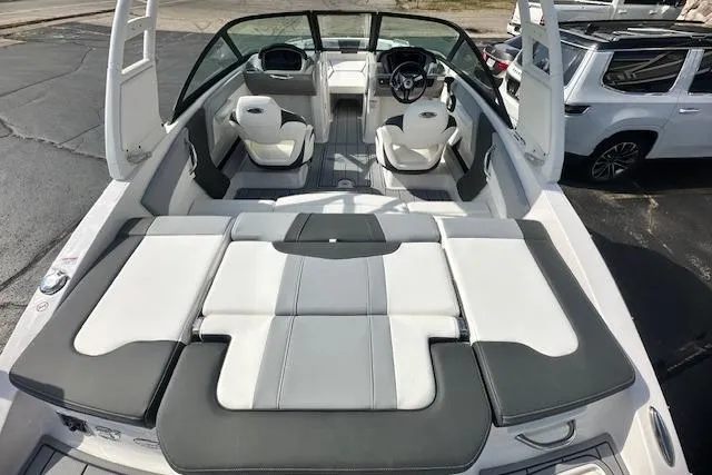 Slide: The Image of 2026 Chaparral 21 SSi boat interior with sleek seating and modern design. - 6