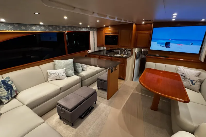 Slide: The Image of Luxurious interior of 2002 Cavileer 48 Flybridge Sportfish yacht with modern amenities. - 5