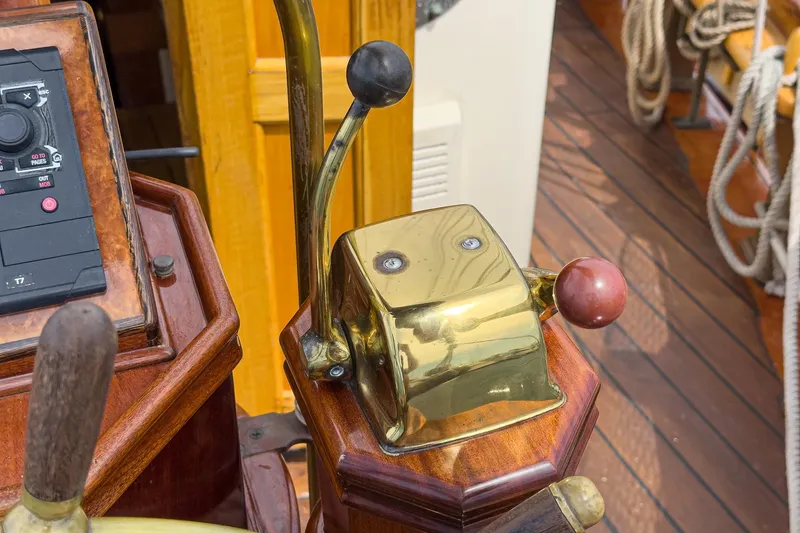 Slide: The Image of Brass and wood helm controls on a 1938 Norwegian Double Ended Ketch. - 46