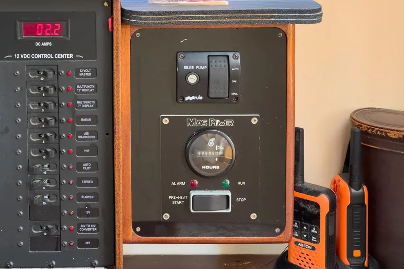 Slide: The Image of Control panel of a 1938 Norwegian Double Ended Ketch with navigation and communication equipment. - 58