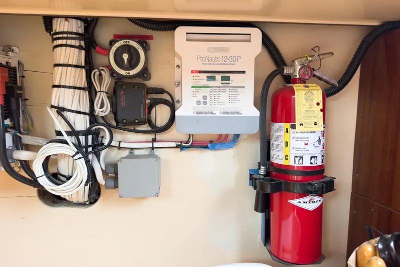 Slide: The Image of Electrical panel and fire extinguisher on a 1938 Norwegian Double Ended Ketch. - 59
