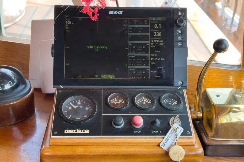 Slide: The Image of Navigation equipment on a 1938 Norwegian Double Ended Ketch, featuring radar and control panel. - 63