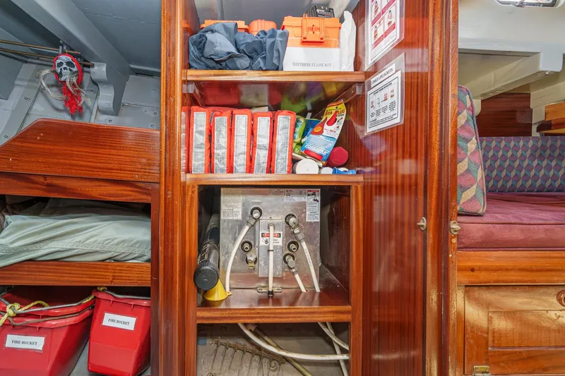 Slide: The Image of Interior of 1938 Norwegian Double Ended Ketch with safety equipment and storage. - 82
