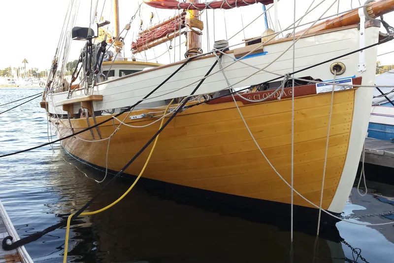 Slide: The Image of Vintage 1938 Norwegian Double Ended Ketch docked, showcasing classic wooden craftsmanship. - 93