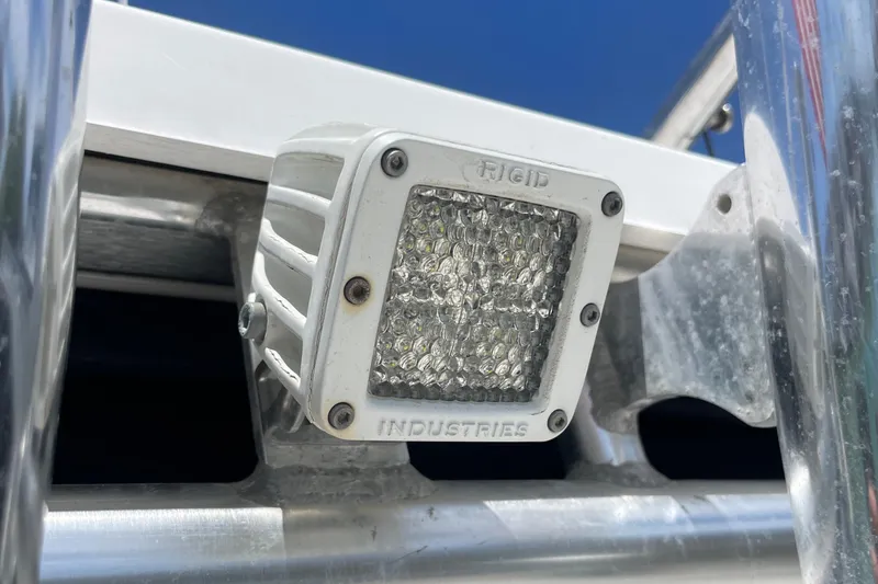 Slide: The Image of LED light on a 2004 Boston Whaler 305 Conquest boat, close-up view. - 27