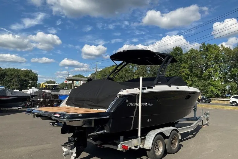 Slide: The Image of 2026 Chaparral SSX 276 boat on trailer under blue sky with clouds. - 3