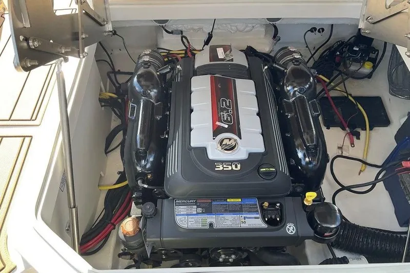 Slide: The Image of Engine compartment of 2026 Chaparral SSX 276 boat with Mercury 6.2L 350 engine. - 48