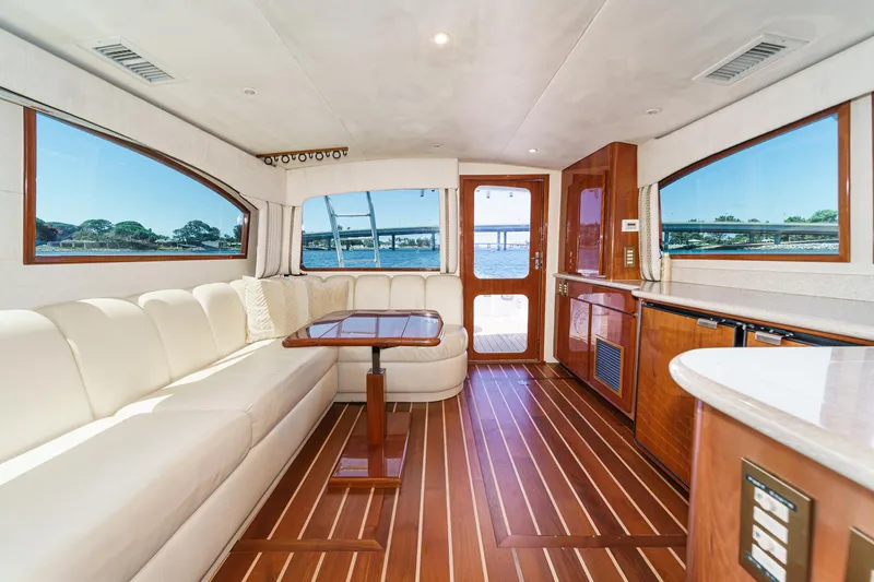 Slide: The Image of Luxurious interior of 2009 Egg Harbor 37 SportYacht with elegant wood flooring and plush seating. - 34