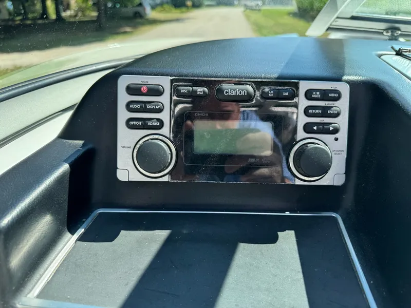 Slide: The Image of 2012 MasterCraft X-15 dashboard with Clarion audio system in sunlight. - 11