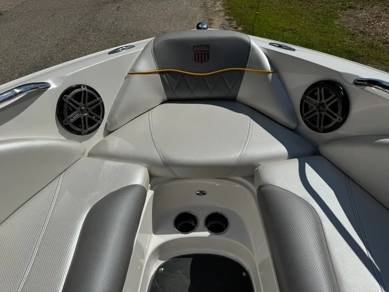 Slide: The Image of Interior of a 2012 MasterCraft X-15 boat with gray and white seating. - 13