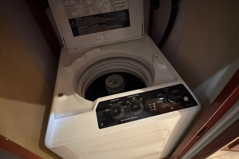 Slide: The Image of Washing machine inside 1999 McKinna 57 Pilothouse yacht, top-loading design. - 208